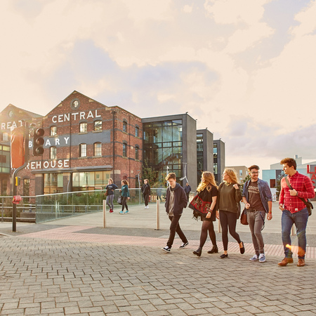 Students walking outside university library