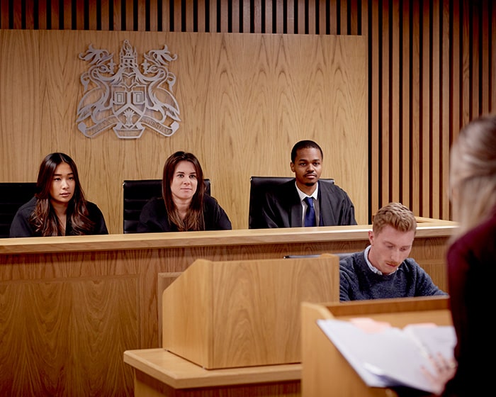 Law students practicing in the Moot Courtroom