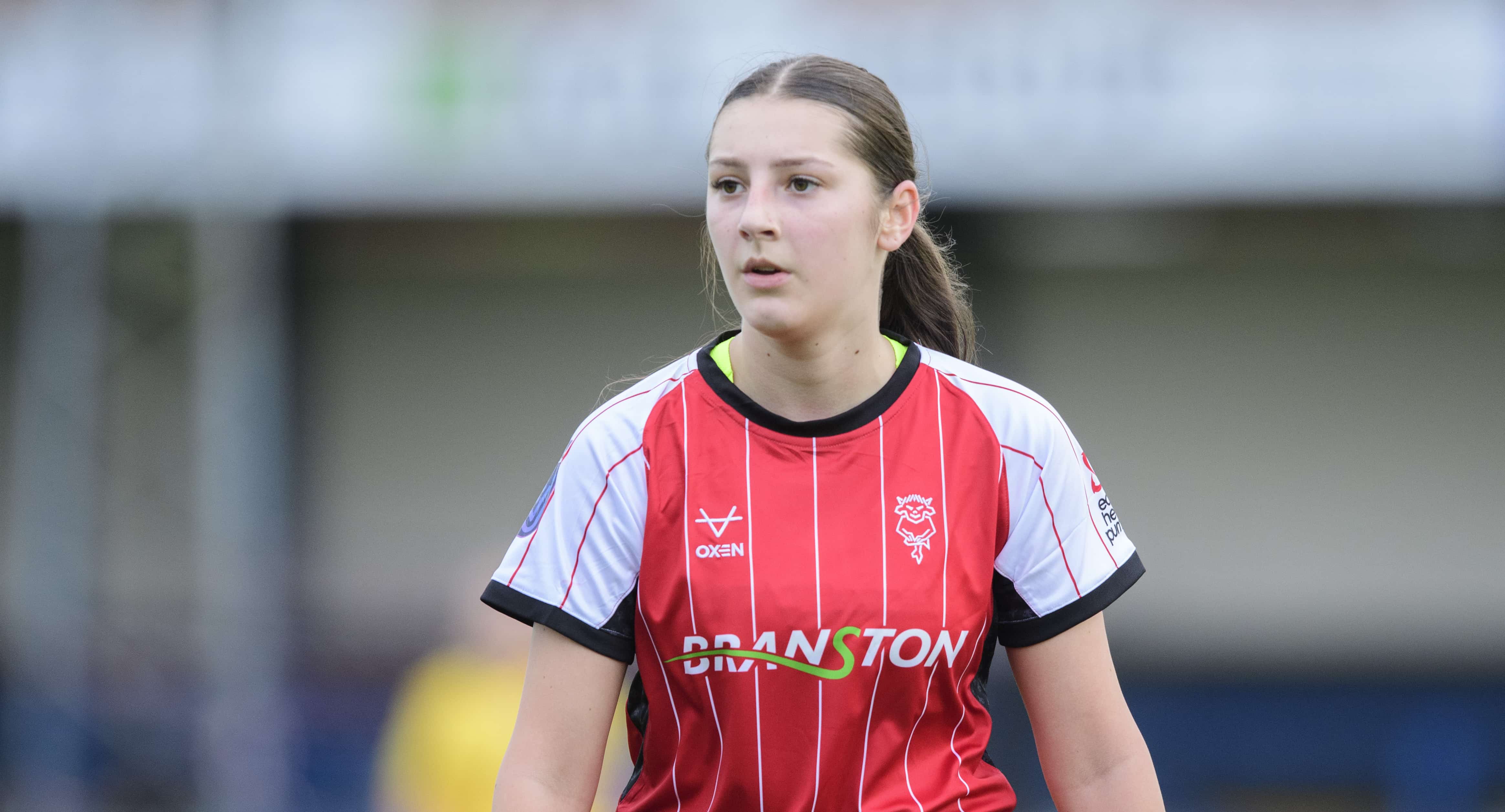 Weronika playing football for Lincoln City FC