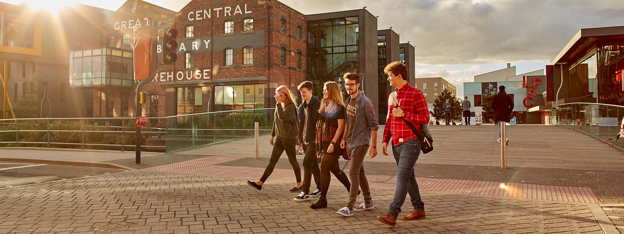 Students walking past the Grand Central Warehouse Library