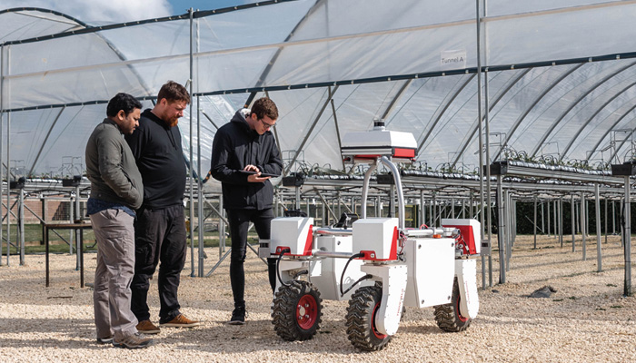 Students with agri-food robot