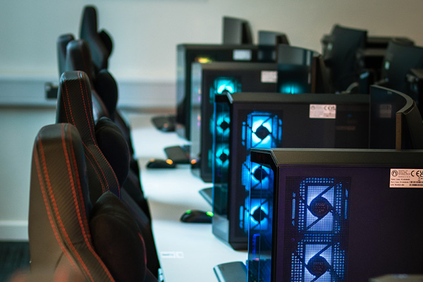 A row of chairs and computers