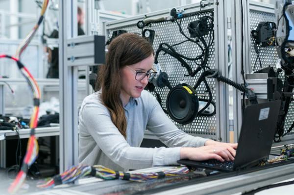 A researcher working on a laptop