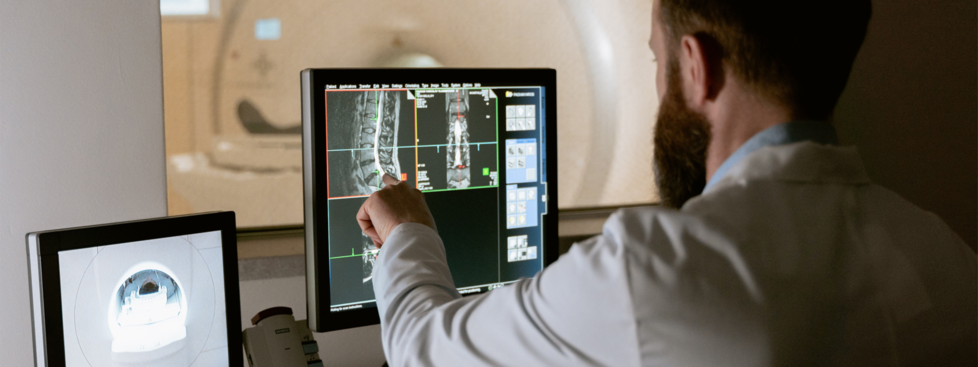 A Diagnostic Radiographer viewing a scan