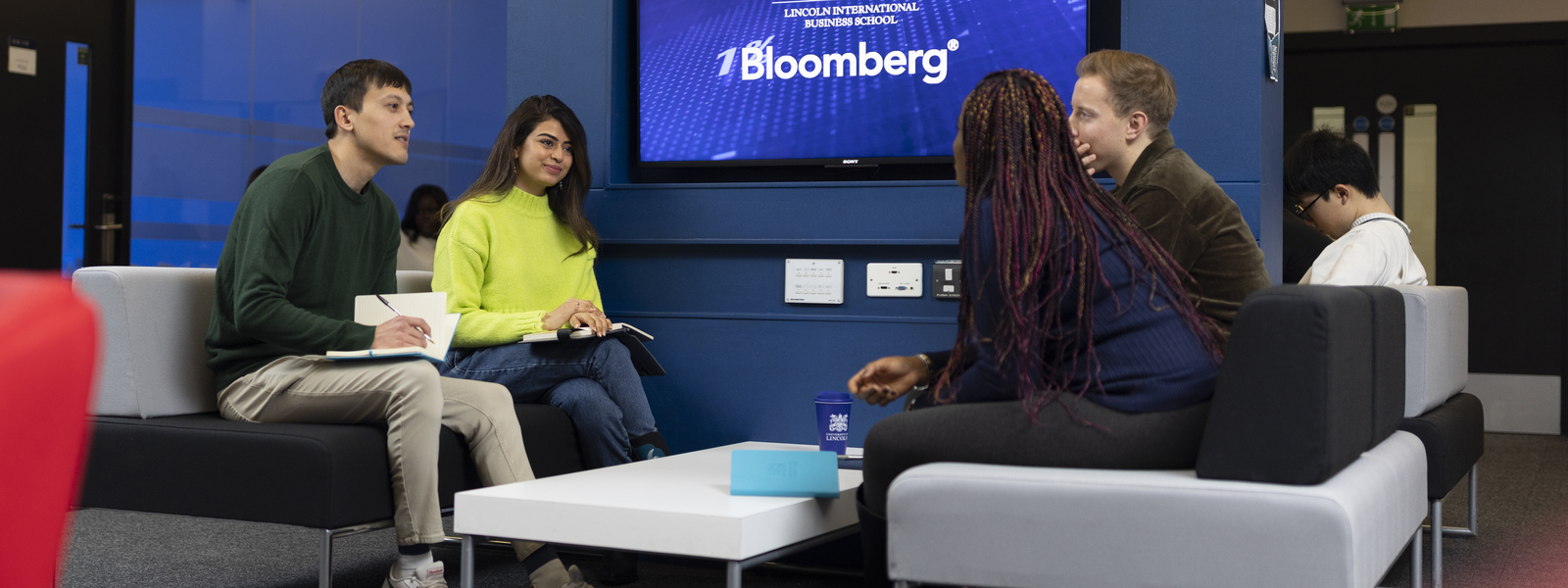 Students chatting in a shared study area