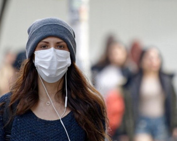 Woman wearing a face mask covering