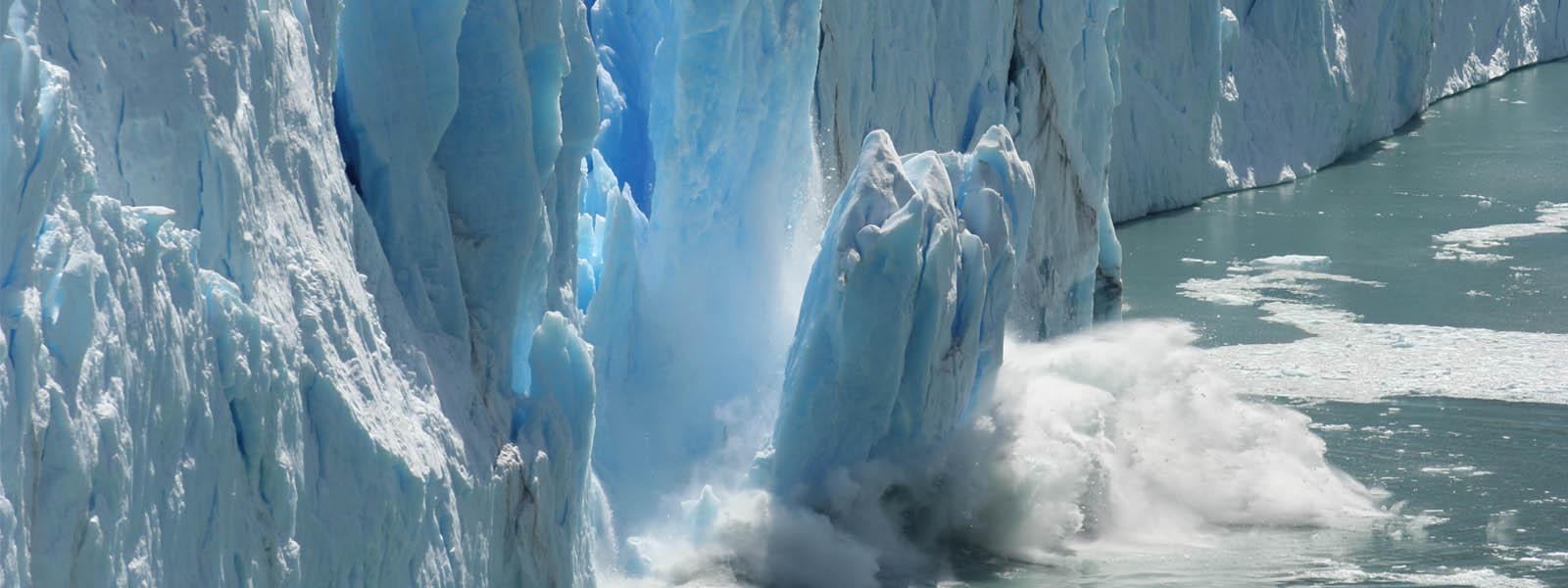 Iceberg melting into the sea