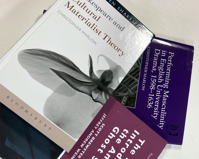 A pile of books on a table