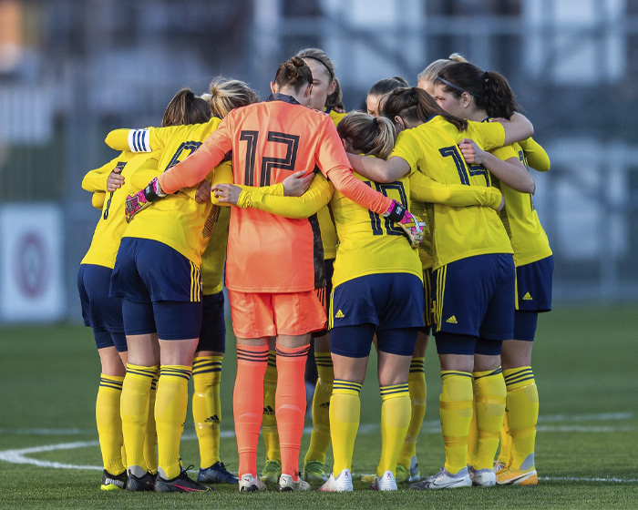 A group of footballers on the pitch